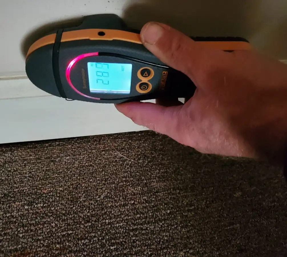 Moisture detection at baseboard during Storm Damage Restoration in Putnam Valley